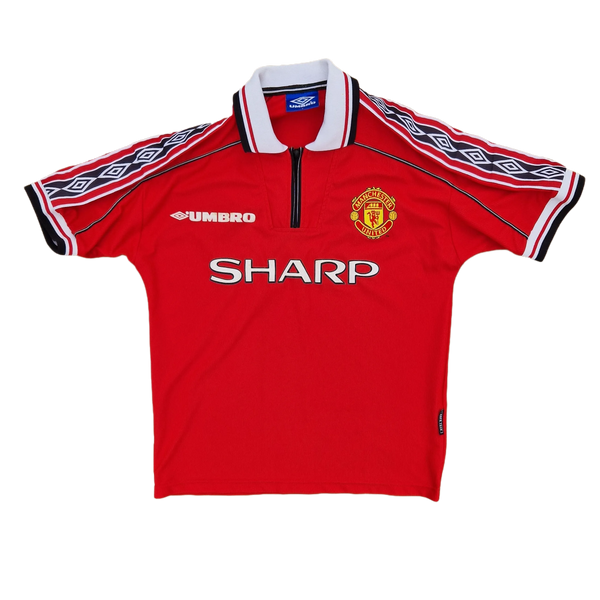 front of classic 1998/00 Manchester United football shirt